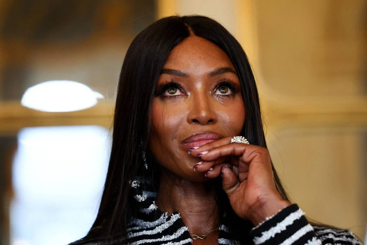 British model Naomi Campbell cries after being awarded the 'Chevalier de l'ordre des Arts et des Lettres' (Knight of the Order of Arts and Letters) title at the French Ministry for Culture in Paris on September 26, 2024. (AFP)