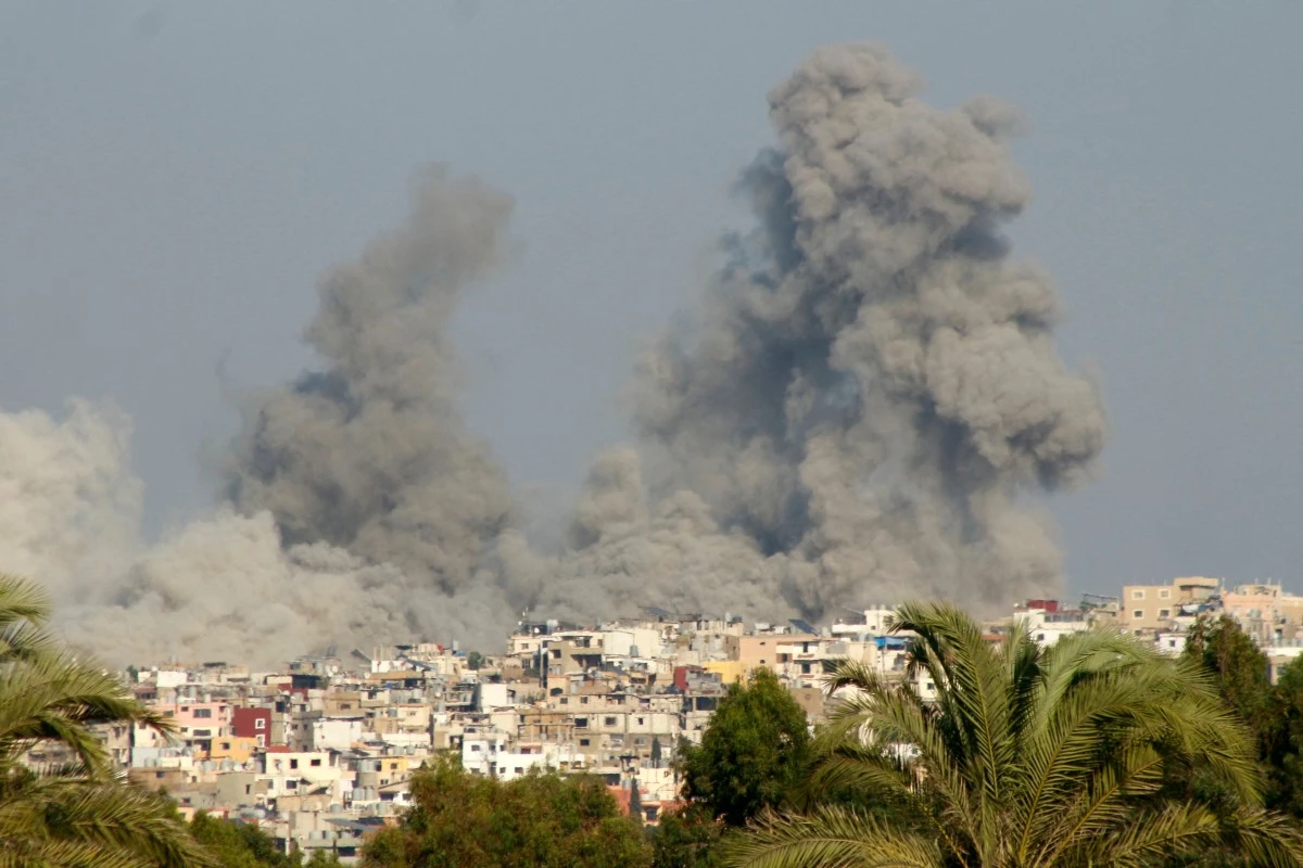 Smoke billows after an Israeli strike on a village near the southern Lebanese city of Tyre on September 29, 2024.(AFP)