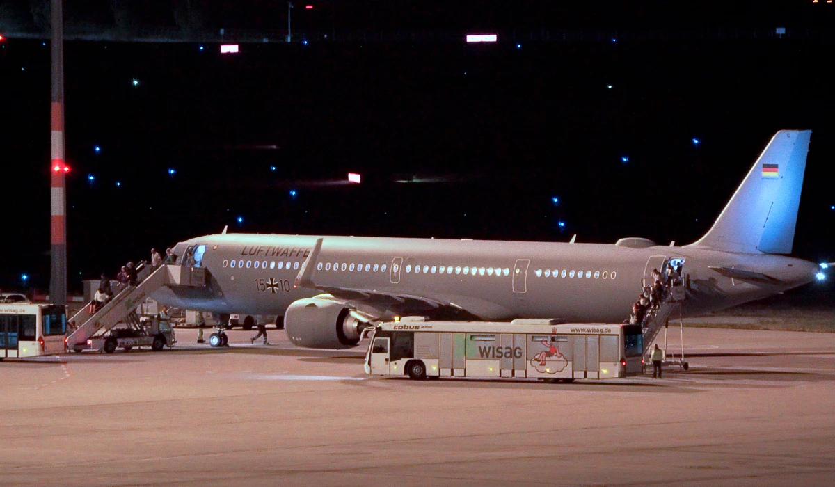 Passengers leave a Bundeswehr aircraft after landing in Berlin's airport, Germany, Monday, Sept. 30, 2024. (AP)