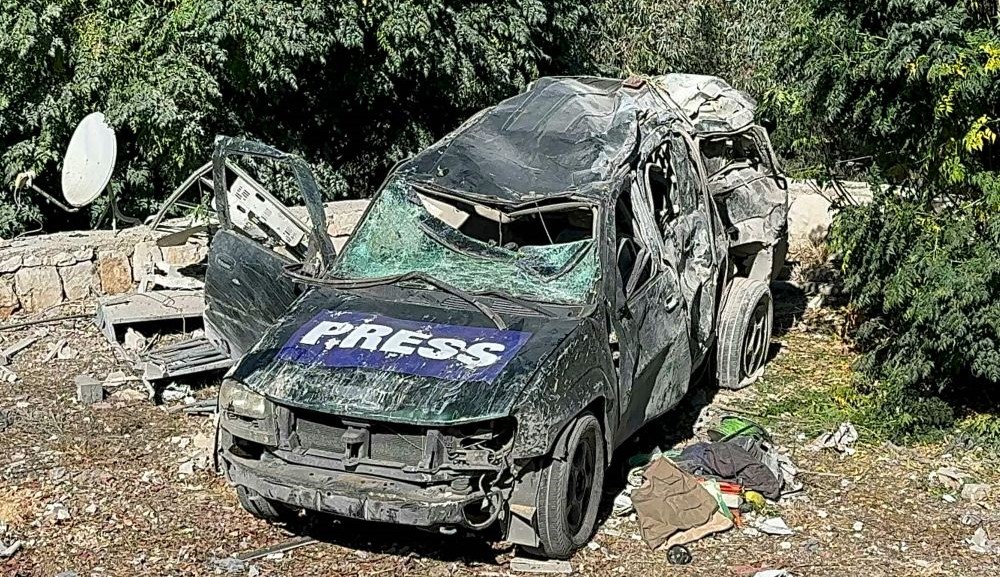 A car marked ‘Press’ at the site of an Israeli airstrike near the southern Lebanese village of Hasbaya, Oct. 25, 2024. (AFP)