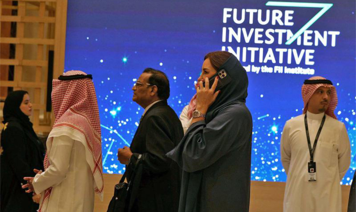 Attendees arrive for the annual Future Investment Initiative (FII) conference in Riyadh. (AFP/File)