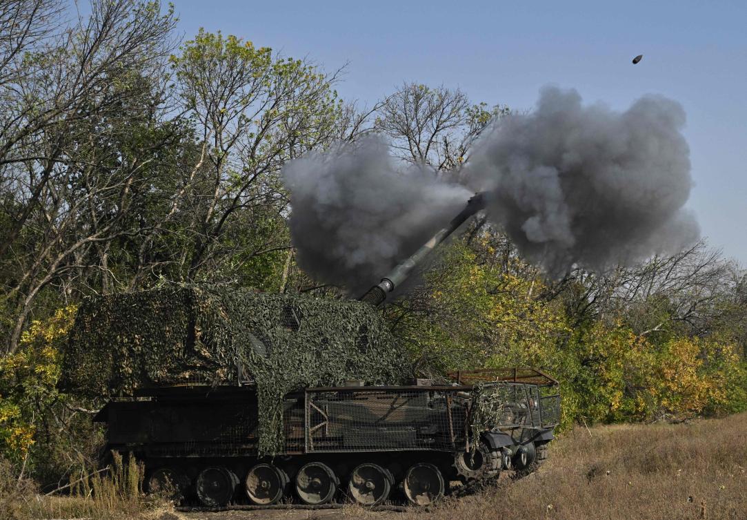 Ukrainian servicemen of the 26th artillery brigade fire an AHS Krab self-propelled howitzer toward Russian positions near the front line in the Chasiv Yar area in the Donetsk region on September 30, 2024, amid the Russian invasion of Ukraine. (AFP)