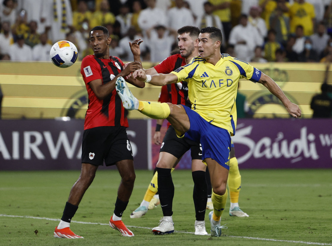 Al-Nassr’s Cristiano Ronaldo in action during the Asian Champions League Group B match between Al-Nassr and Al-Rayyan at Al-Awwal Park in Riyadh Monday. (Reuters)