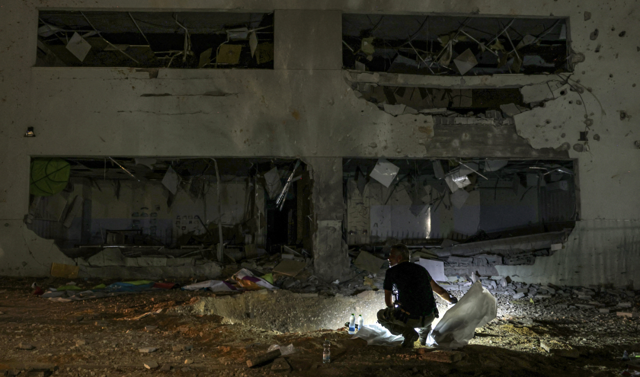 This picture shows a view of a heavily-damaged school building after a projectile exploded upon impact, in Israel's southern city of Gedera on October 1, 2024. (AFP/File)
