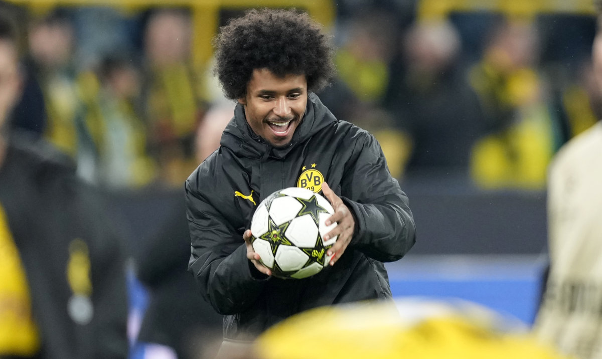 Dortmund's Karim Adeyemi keeps the ball after scoring three goals at the Champions League opening phase soccer match between Borussia Dortmund and Celtic FC at the BVB Stadion in Dortmund Tuesday. Dortmund won 7-1. (AP)
