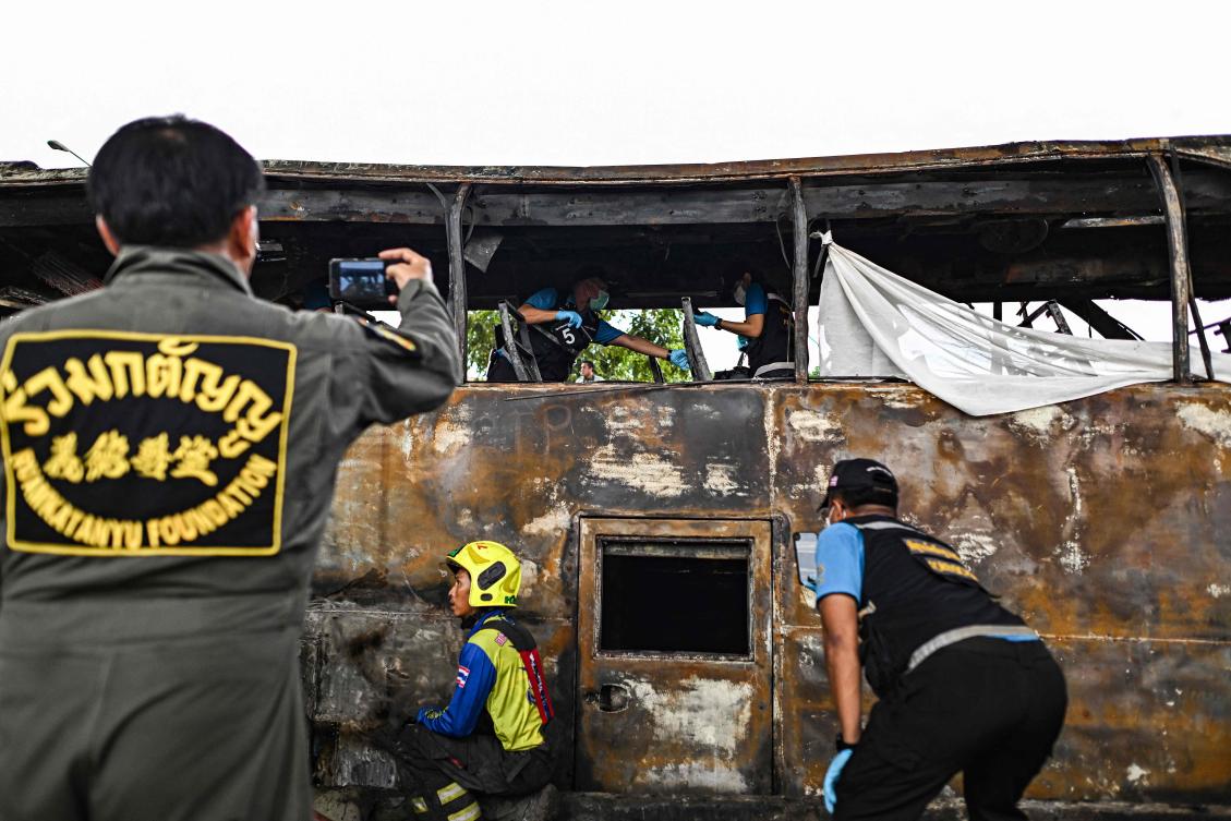 The recovery work and confirmation of the total dead had been delayed earlier because the burned vehicle, which was fueled with natural gas, remained too hot to enter for hours. (AFP)