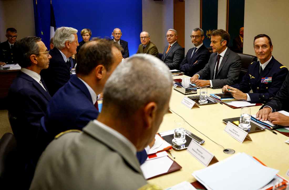 French President Emmanuel Macron, second right, chairs a National Defence and Security Council dedicated to Lebanon with Prime Minister Michel Barnier, second left, and Interior Minister Bruno Retailleau, left, at the Elysee Palace in Paris. (AP)