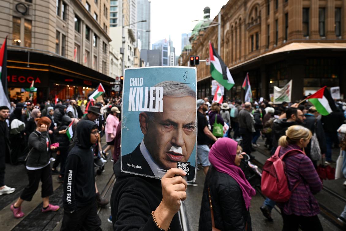 Other attendees at the pro-Palestine protests, which took place in Sydney and Melbourne last week, also waved Hamas flags or placards with slain Hezbollah leader Hassan Nasrallah. (AFP)