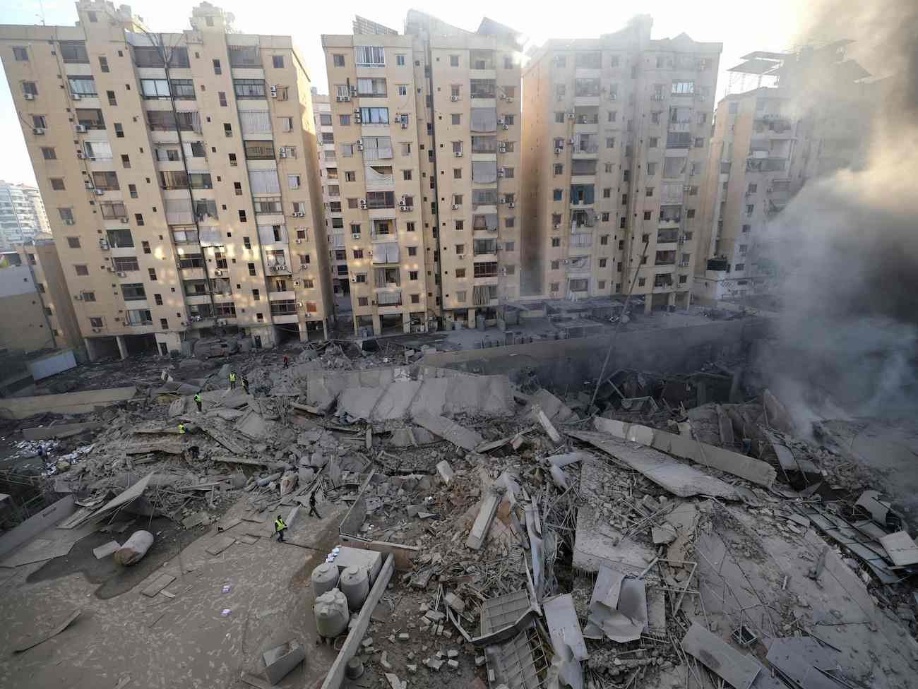 Dust and smoke billow from the site of an overnight Israeli airstrike in Beirut’s southern suburb of Shayyah on October 2, 2024. (AFP)