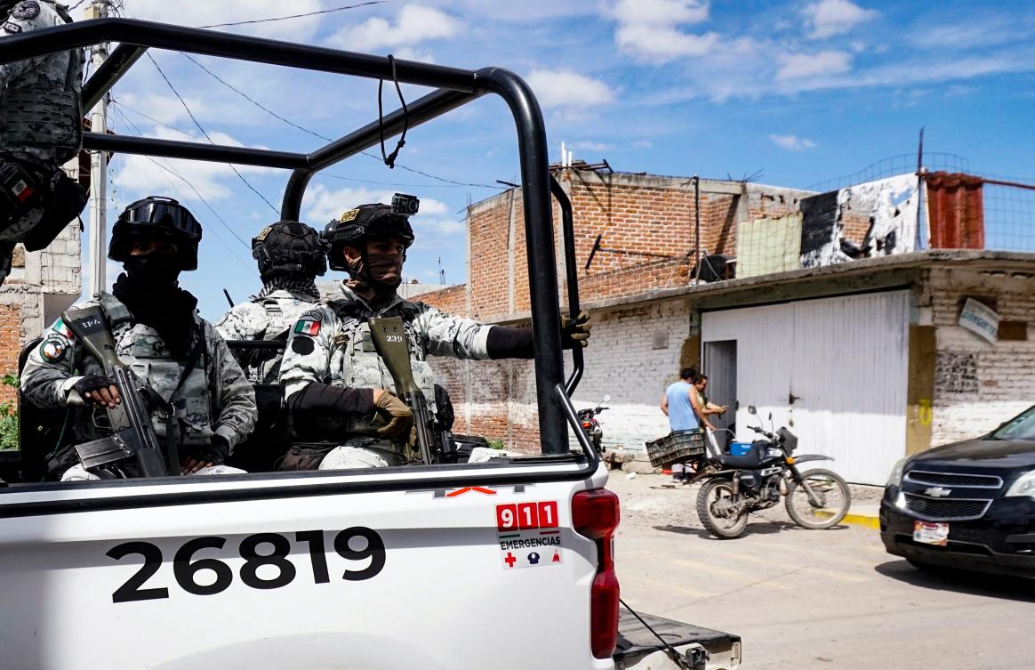 National Guard members patrol outside a rehabilitation center where unknown gunmen killed four people and injured five in Salamanca, Guanajuato state, Mexico on Oct. 2, 2024. (AFP)