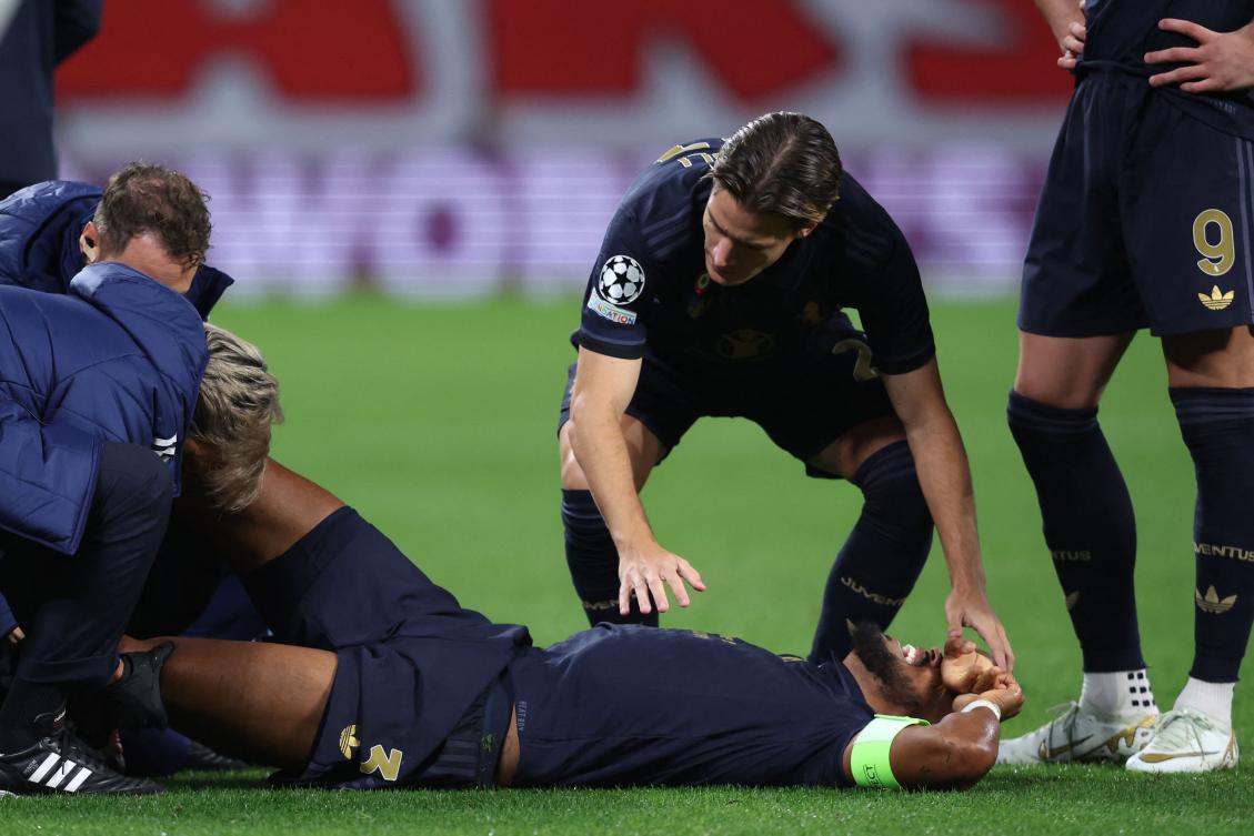 Juventus’ Brazilian defender Bremer lies on the pitch after picking up an injury during their UEFA Champions League match against RB Leipzig at the Red Bull Arena in Leipzig on Oct. 2, 2024. (AFP)