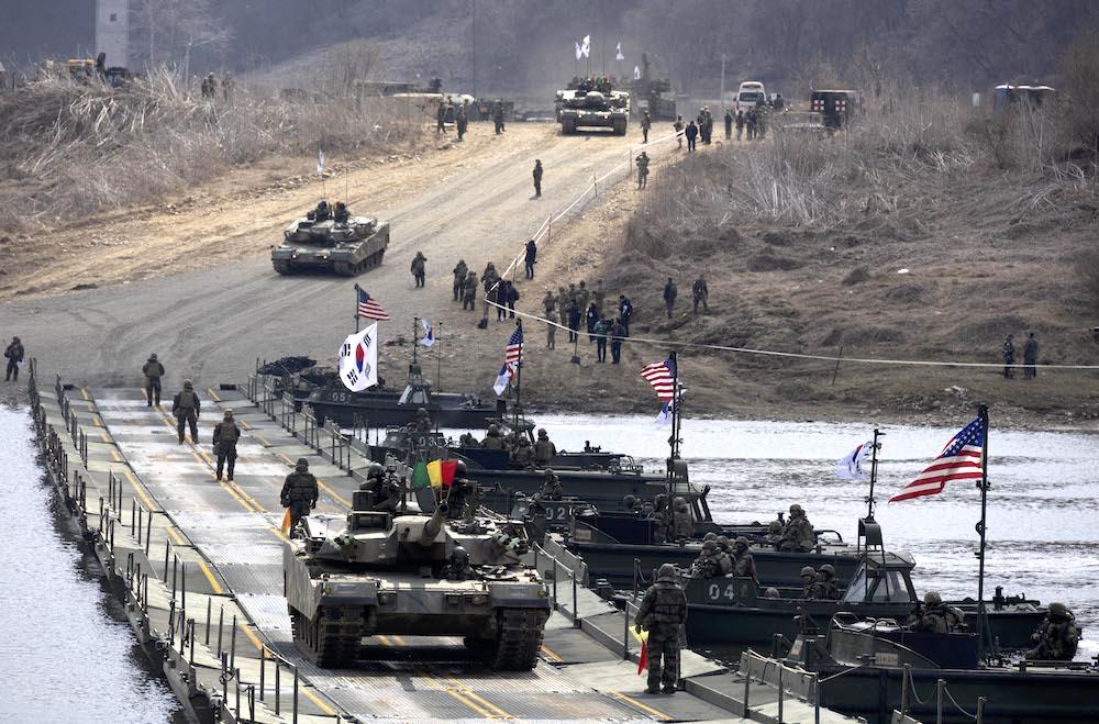 South Korean and US soldiers conduct a joint river-crossing exercise in Yeoncheon, Gyeonggi province on March 20, 2024. (AFP)