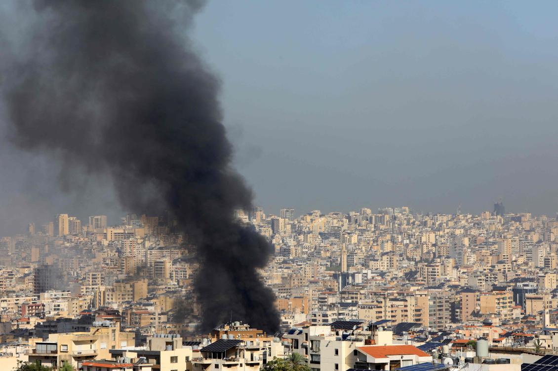 Smoke rises from buildings hit in an overnight Israeli airstrike that targeted Beirut’s southern suburbs on Octo. 3, 2024. (AFP)