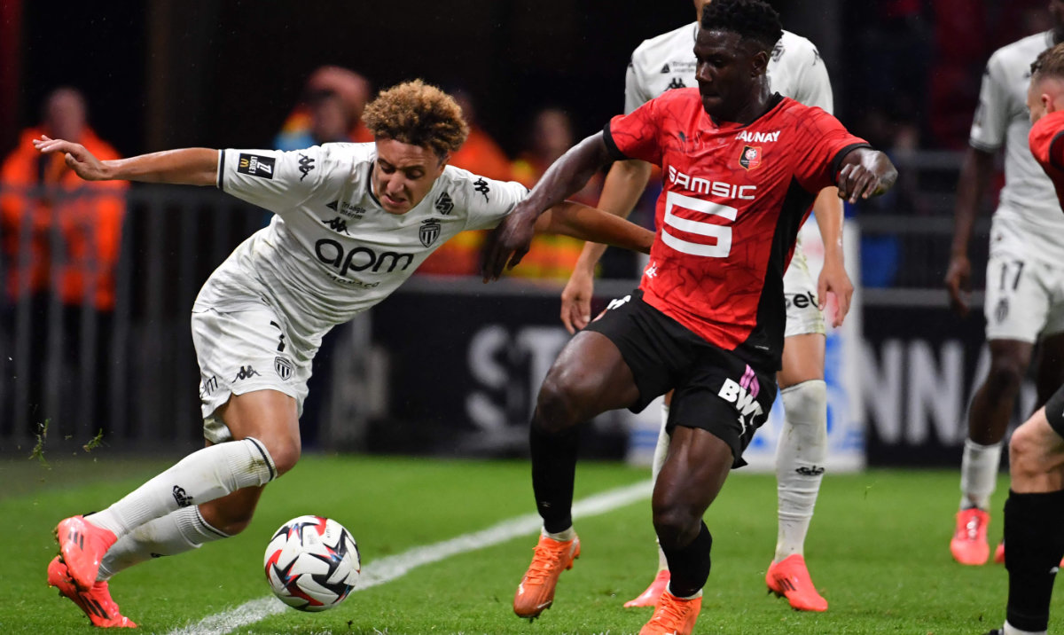 Monaco's Moroccan midfielder Eliesse Ben Seghir (L) fights for the ball with Rennes' Dutch midfielder Azor Matusiwa during the French L1 football match between Stade Rennais FC and AS Monaco at the Roazhon Park in Rennes on October 5, 2024. (AFP)