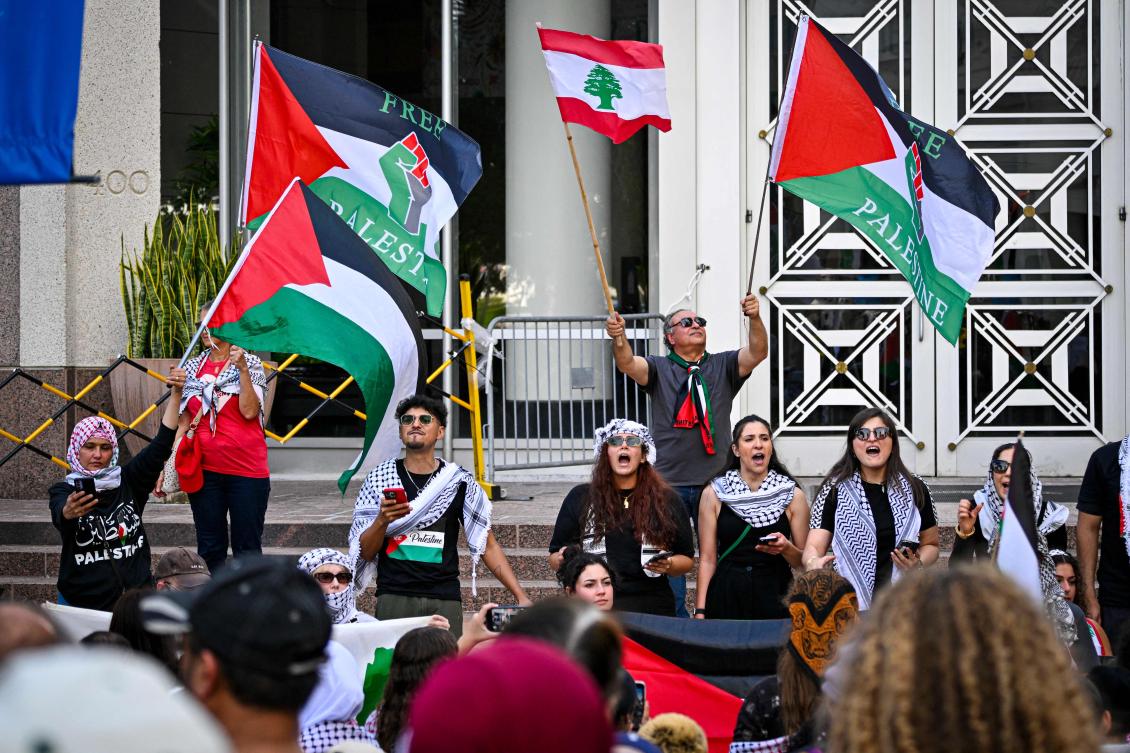 Pro-Palestinian protesters rally in support of Gaza and Lebanon in front of the City Hall to mark one year of the war between Hamas and Israel in Orlanda, Florida, on October 5, 2024.(AFP)