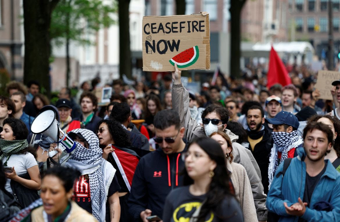 Students and employees of the University of Amsterdam take part in a march against Israel's war on Gaza. (Reuters)