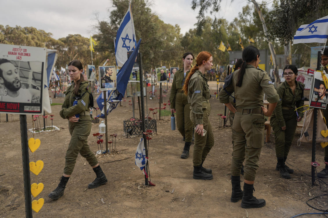 Soldiers visit the site of the Nova music festival, where hundreds of revelers were killed and abducted by Hamas, on the eve of the one-year anniversary of the attack, near Kibbutz Reim, southern Israel. (File/AP)