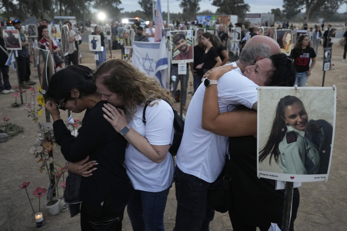 People visit the site of the Nova music festival, where hundreds of revelers were killed and abducted by Hamas and taken into Gaza, on the one-year anniversary of the attack, near Kibbutz Reim, southern Israel. (File/AP)