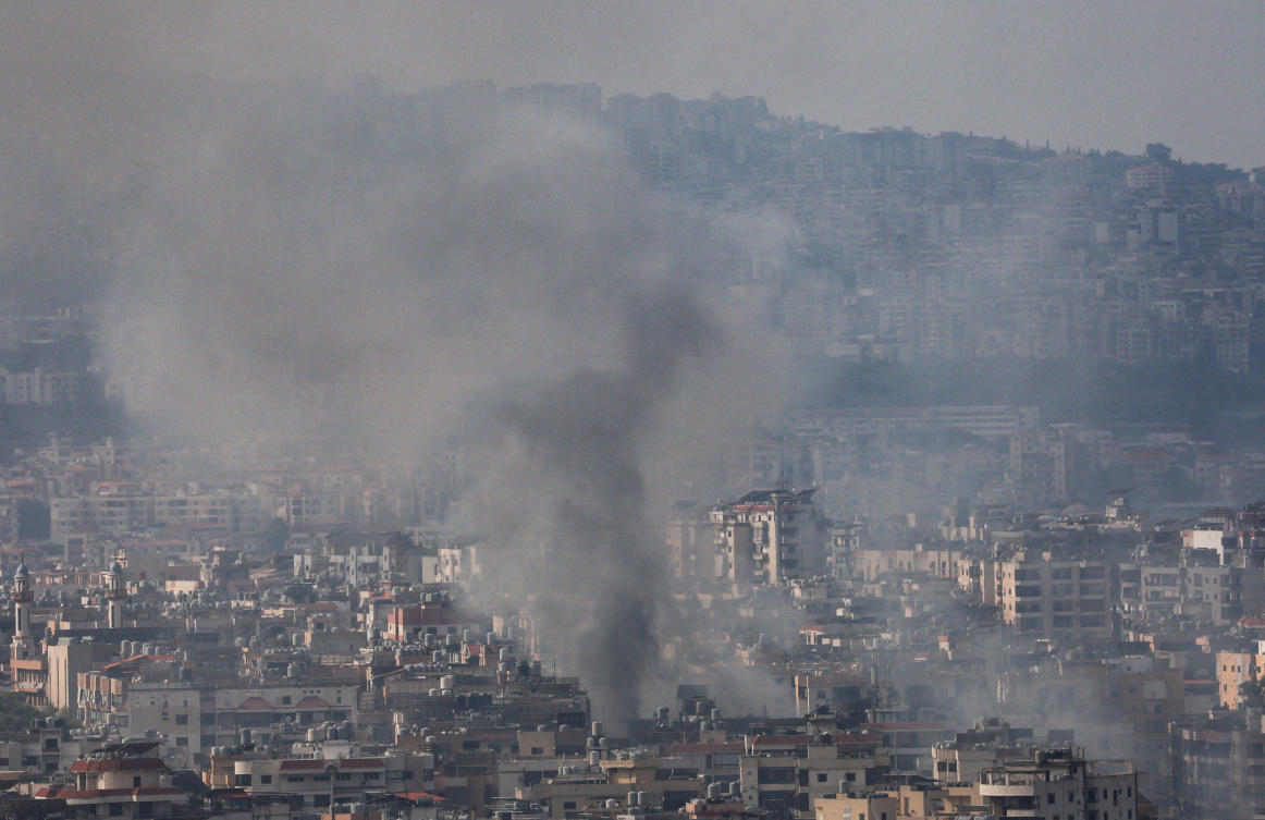Smoke rises over Dahiyeh in Beirut's southern suburbs after overnight Israeli air strikes, amid ongoing hostilities between Hezbollah and Israeli forces, as seen from Sin El Fil, Lebanon, October 7, 2024. (Reuters)