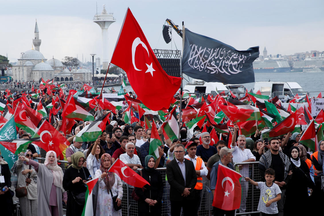 Demonstrators wave Turkish and Palestinian flags during a protest to express support for Palestinians in Gaza, a day ahead of the anniversary of the October 7th attack, amid the Israel-Hamas conflict, in Istanbul, Turkiye, October 6, 2024. (REUTERS/FILE)