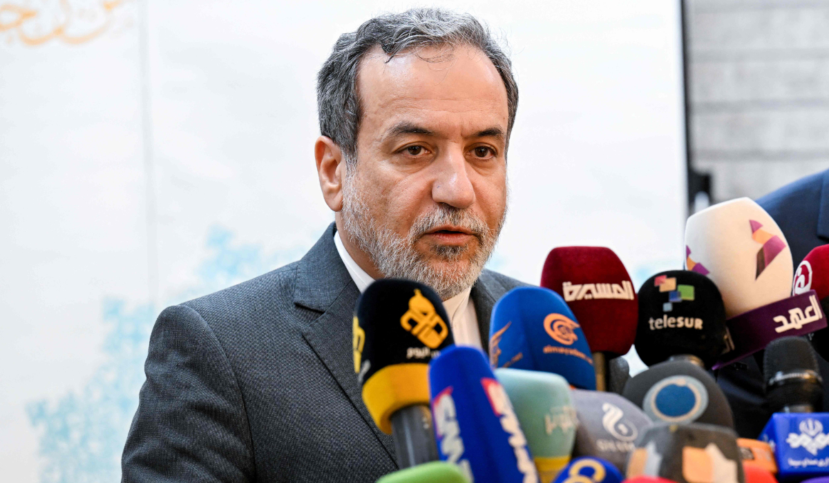 Iranian Foreign Minister Abbas Araghchi speaks to the press after meeting with Syrian officials at the Iranian embassy in Damascus on October 5, 2024. (AFP)