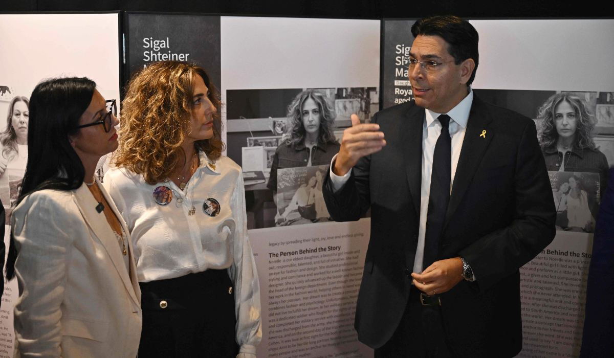 Israeli Ambassador to the UN Danny Danon speaks to mothers who lost their children in the October 7th terror attack at the “Eternal Embrace” photo exhibition at United Nations Headquarters in New York City on October 7, 2024. (AFP)