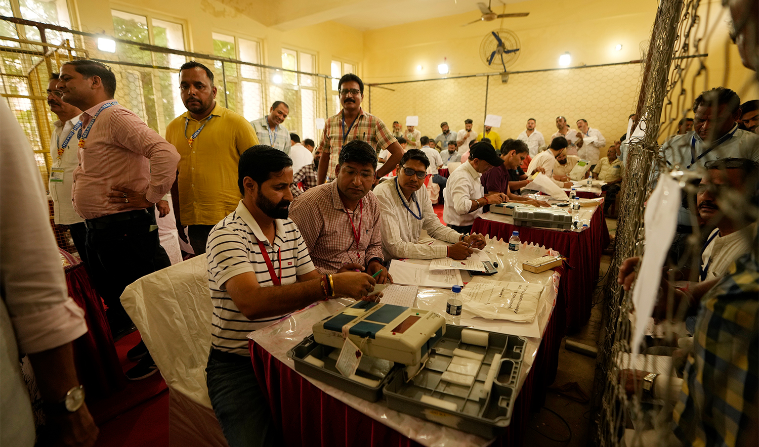 Election officers count votes for the recent election at a counting center in Jammu, India, on October 8, 2024. (AP)