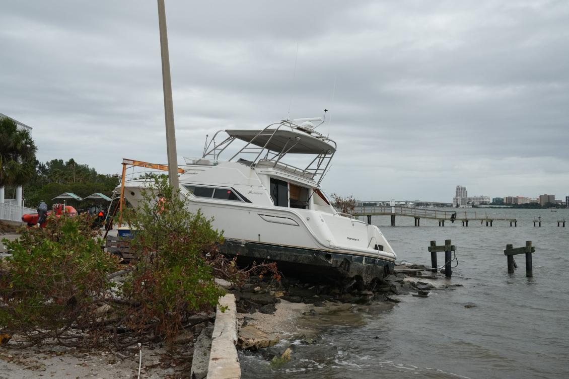 A beached boat as a result of Hurricane Helene is seen in Clearwater, Florida ahead of Hurricane Milton’s expected mid-week landfall, on Oct. 6, 2024. (AFP)