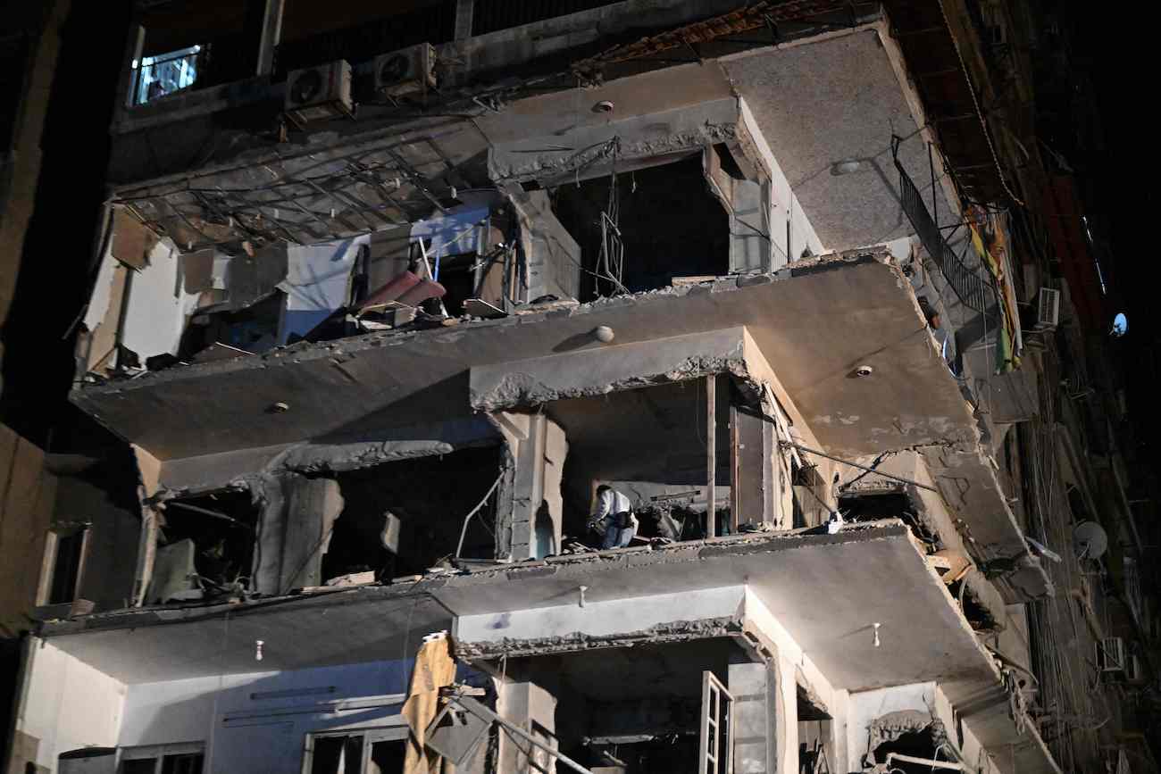 A view of a residential building hit by a reported Israeli air strike, in the Mazzeh suburb on the western outskirts of Syria’s capital Damascus on October 8, 2024. (AFP)
