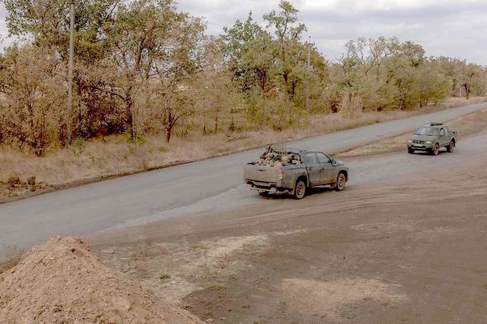 Ukraine’s army had withdrawn from the eastern town of Vugledar, above, handing Russia one of its most significant territorial advances in weeks. Above, Ukrainian servicemen drive in the Vugledar direction of the eastern Donetsk region on Oct. 8, 2024. (AFP)