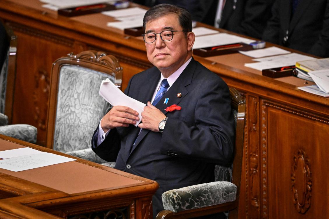 Above, Japan’s Prime Minister Shigeru Ishiba attends a session at the lower house in Tokyo on Oct. 9, 2024. Ishiba dissolved parliament ahead of the October 27 snap elections, banking on his political honeymoon and a fragmented opposition. (AFP)