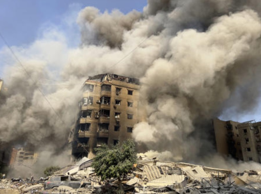 Smoke rises as a building collapses in Beirut’s southern suburbs, on Sept. 28, 2024. (AP/File)