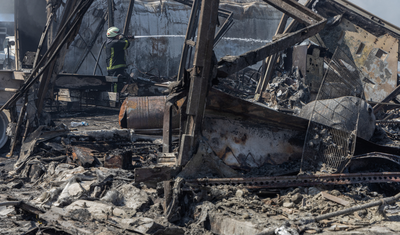 A Ukrainian firefighter extinguishes a fire on a site following an air attack, in the Odesa region, on August 26, 2024. (AFP/File)