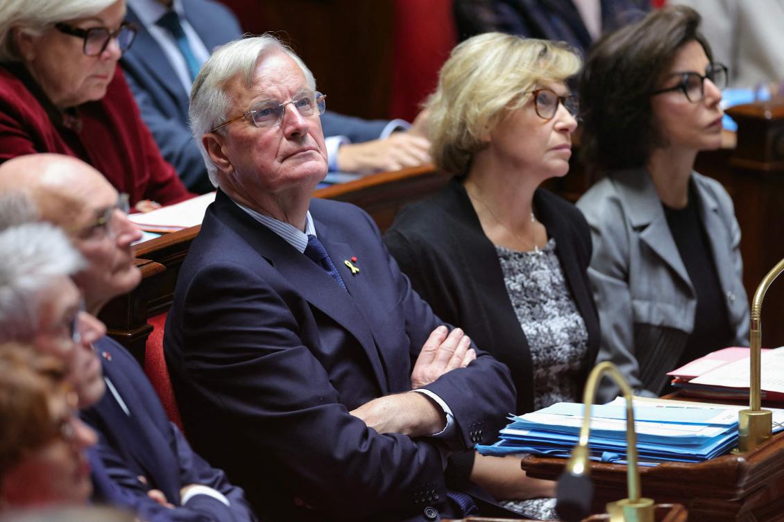 French Prime Minister Michel Barnier (C) attends a a parliamentary session at The National Assembly in Paris on October 8, 2024. (AFP)
