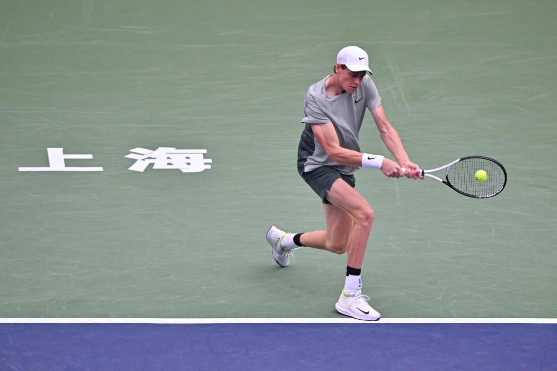 Italy’s Jannik Sinner hits a return to Russia’s Daniil Medvedev during their men’s singles match at the Shanghai Masters tennis tournament in Shanghai on Oct. 10, 2024. (AFP)