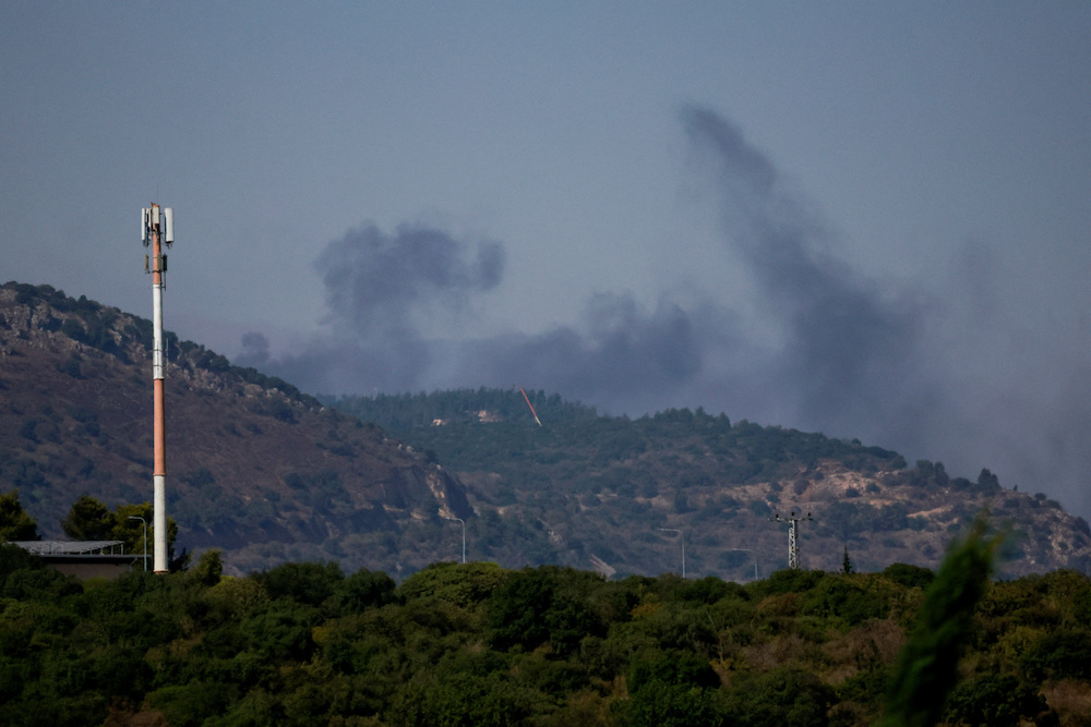 Smoke rises from southern Lebanon following Israeli strikes, amid hostilities between Hezbollah and Israel, as seen from northern Israel, Oct. 10, 2024. Reuters