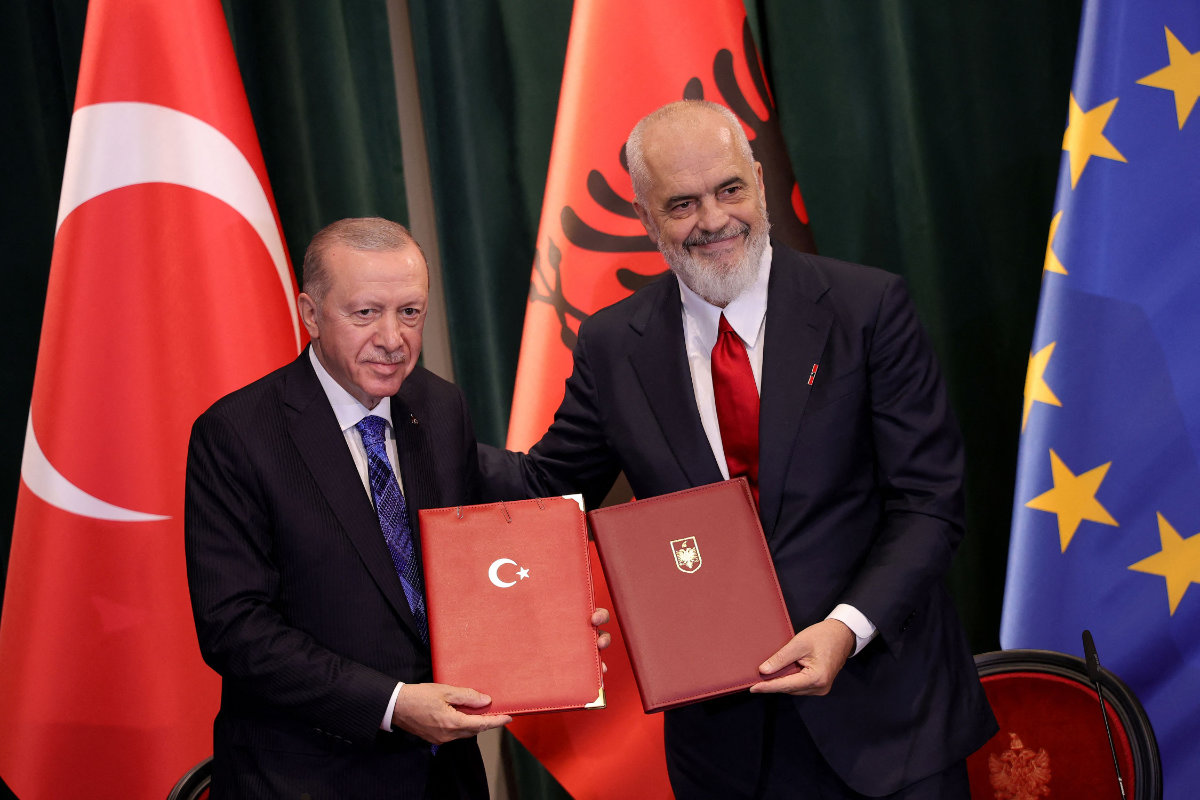 Albanian Prime Minister Edi Rama (R) and Turkey's President Recep Tayyip Erdogan exchange signed documents at the Prime Minister's office in Tirana, on October 10, 2024. (AFP)