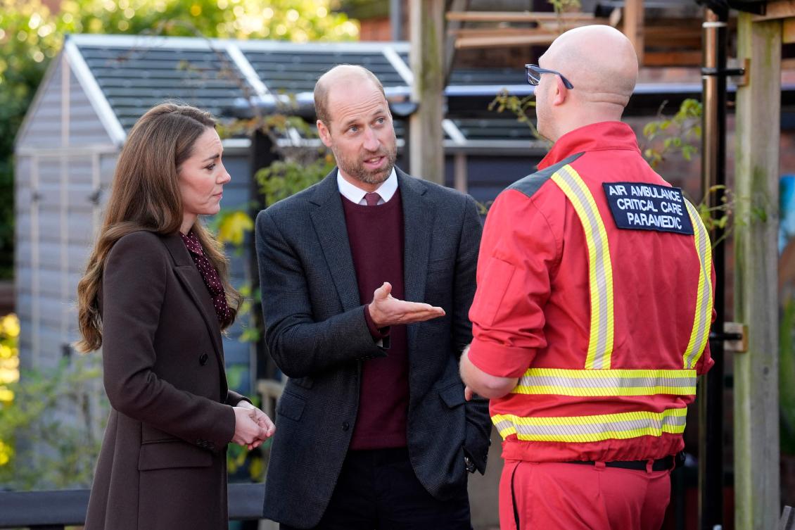 The royal couple spent 90 minutes meeting privately with the families of the victims. (AFP)