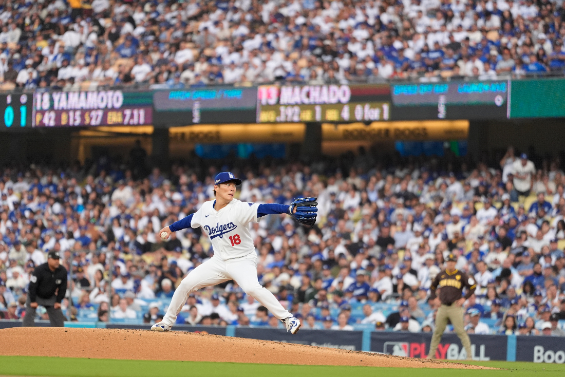 Los Angeles Dodgers pitcher Yoshinobu Yamamoto throws to a San Diego Padres batter during the fourth inning in Game 5 of a baseball NL Division Series Friday in Los Angeles. (AP)