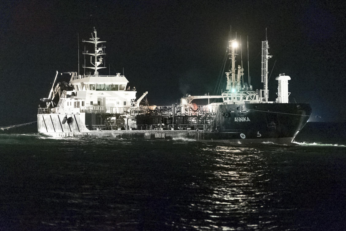 The oil tanker Annika, which was wrecked in the Baltic Sea after a fire, is towed to Rostock, Germany on Oct. 12, 2024. (dpa via AP)