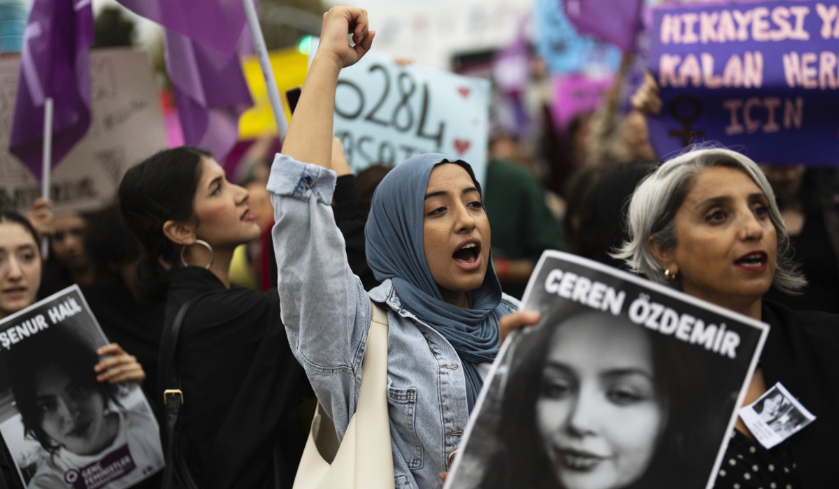 Women shout slogans during a protest against violence against women in Istanbul, Turkey, Saturday, Oct. 12, 2024. (AP)