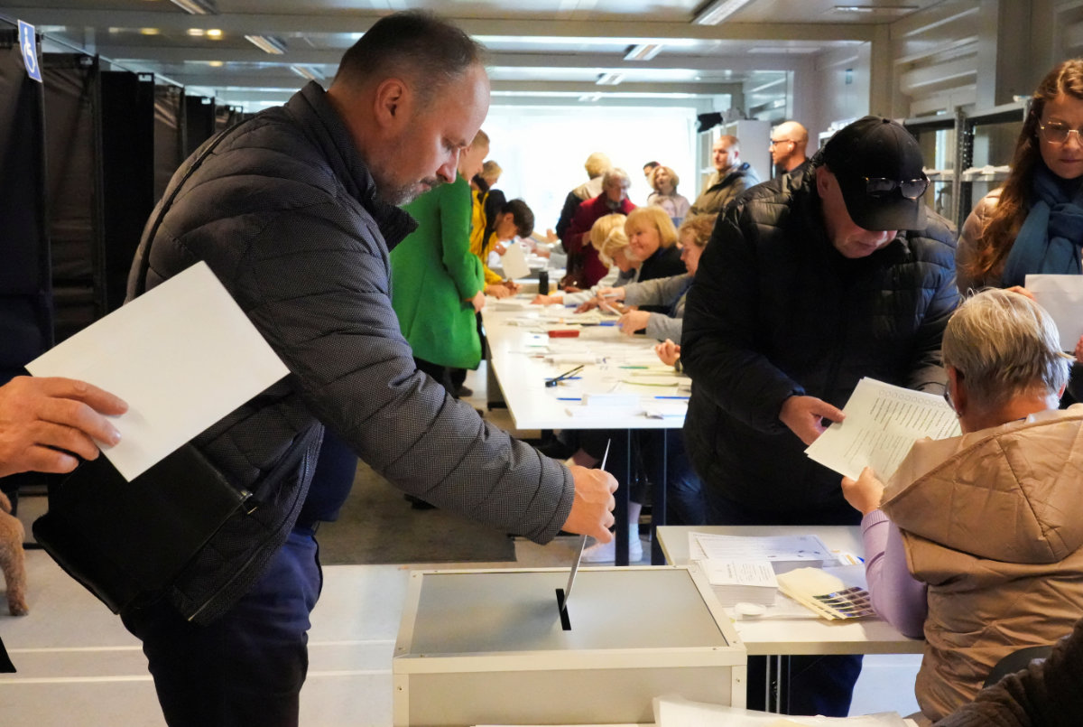 A man casts a ballot during early voting in the Lithuanian general elections in Vilnius, Lithuania, on October 8, 2024. (REUTERS)