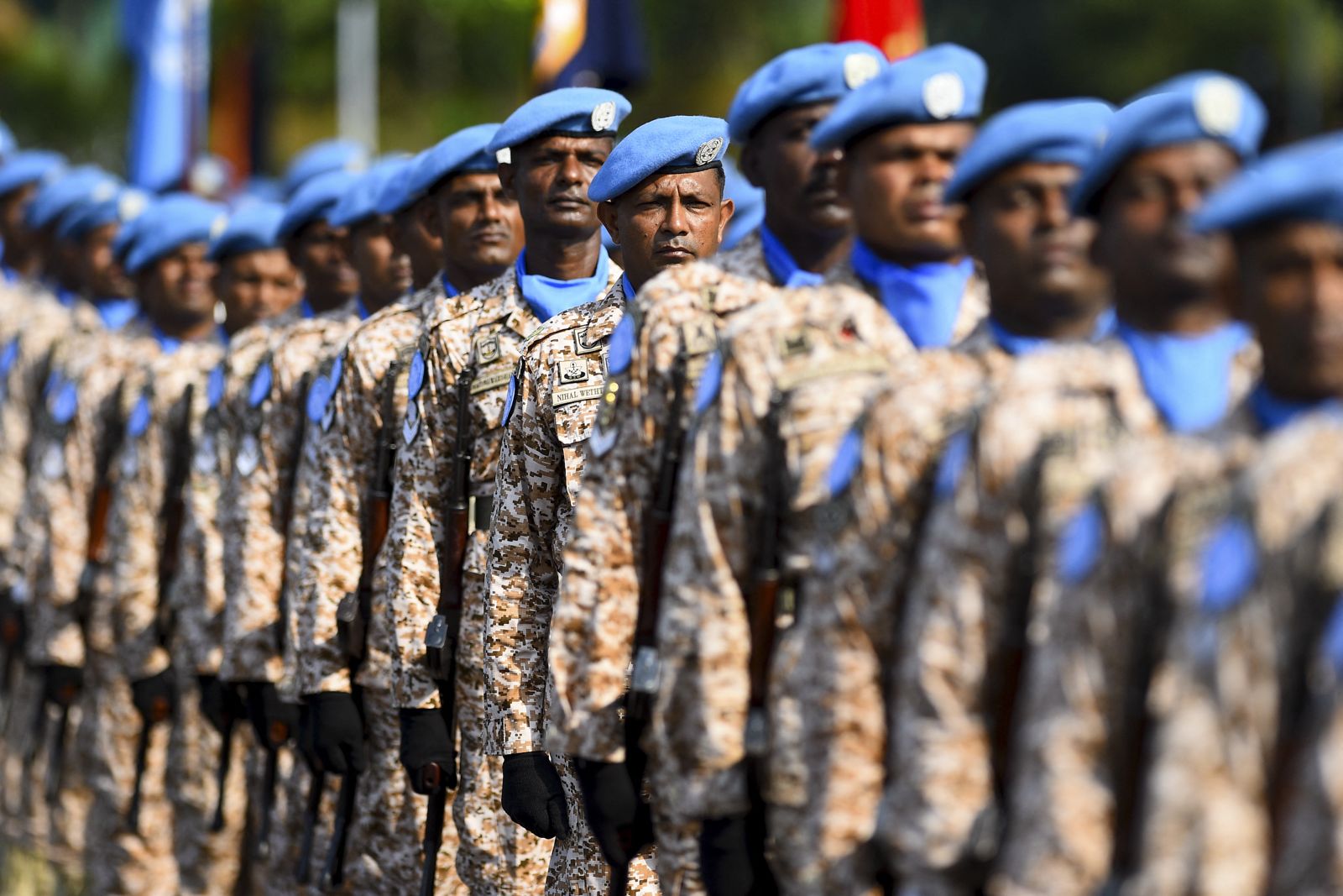 Sri Lankan troops march during a passing out parade before leaving for UN peacekeeping duties, at the Sri Lanka's Institute of Peace Support Operations Training centre in Kukuleganga, April 8, 2021. (AFP/File)