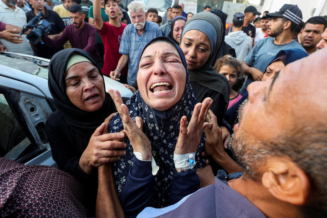 The grandmother of Palestinian boy Yaman Al-Zaanin, who lost his life in an Israeli strike on a school-turned shelter, reacts at Al-Aqsa Martyrs Hospital in Deir Al-Balah in the central Gaza Strip. (Reuters)