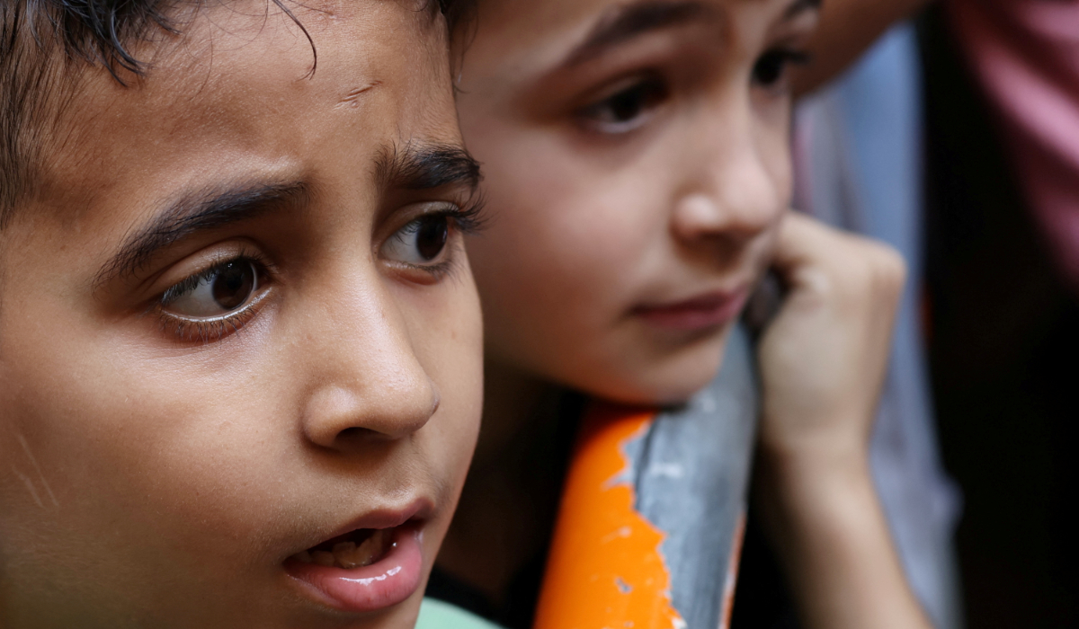 Children living in a shelter for displaced families wait to receive food aid from a local restaurant "Carneo", in Beirut, Lebanon October 14, 2024. (REUTERS)