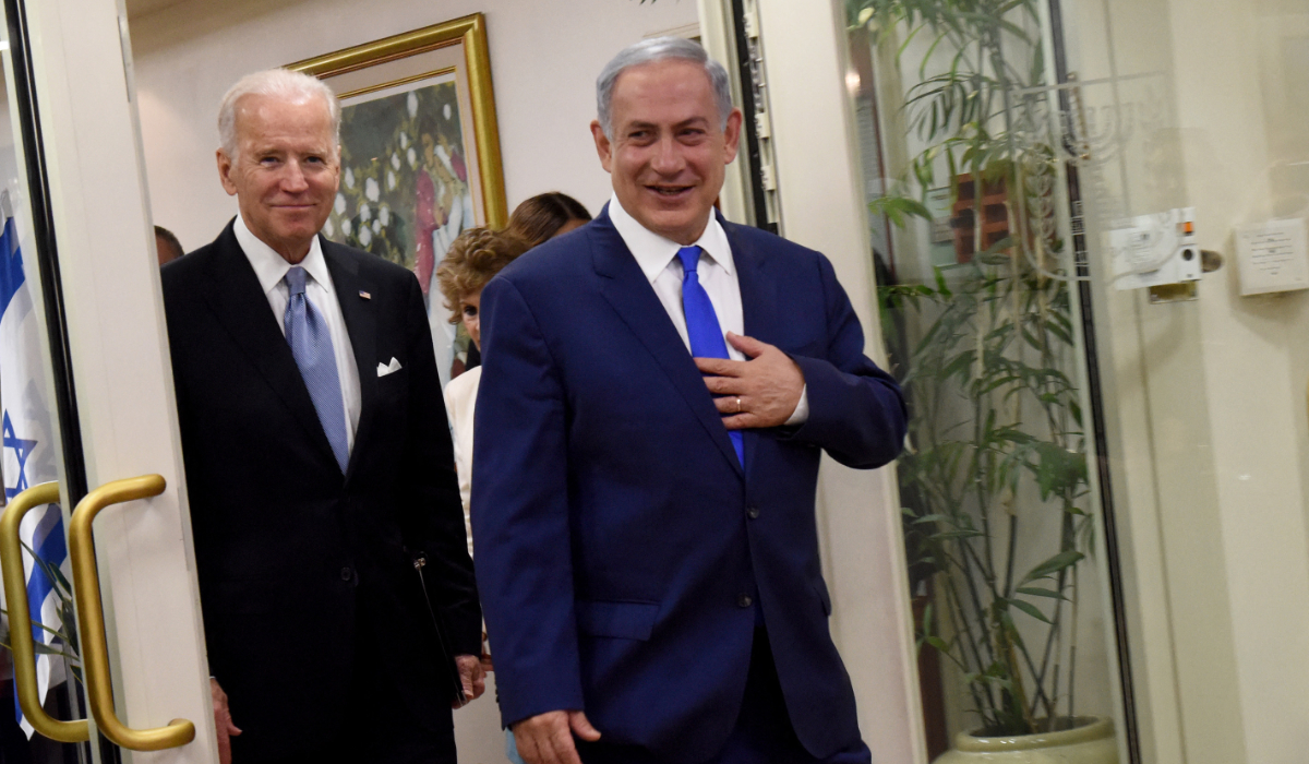 US President Joe Biden and Israeli Prime Minister Benjamin Netanyahu arrive to deliver joint statements in the prime minister's office in Jerusalem on March 9, 2016. (AFP file photo)
