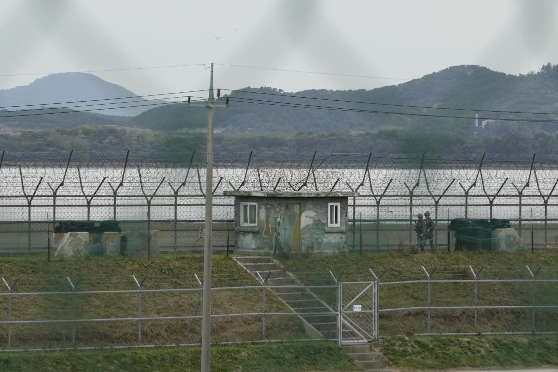 South Korean army soldiers patrol along the barbed-wire fence in Paju, South Korea, near the border with North Korea. (File/AP)