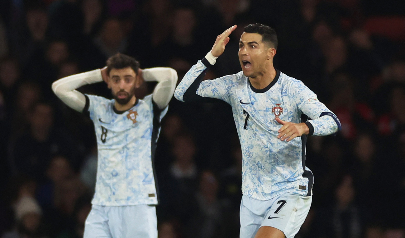 Portugal's Cristiano Ronaldo and Bruno Fernandes react during the UEFA Nations League -Group A1 match between Scotland and Portugal on October 15, 2024. (Reuters)