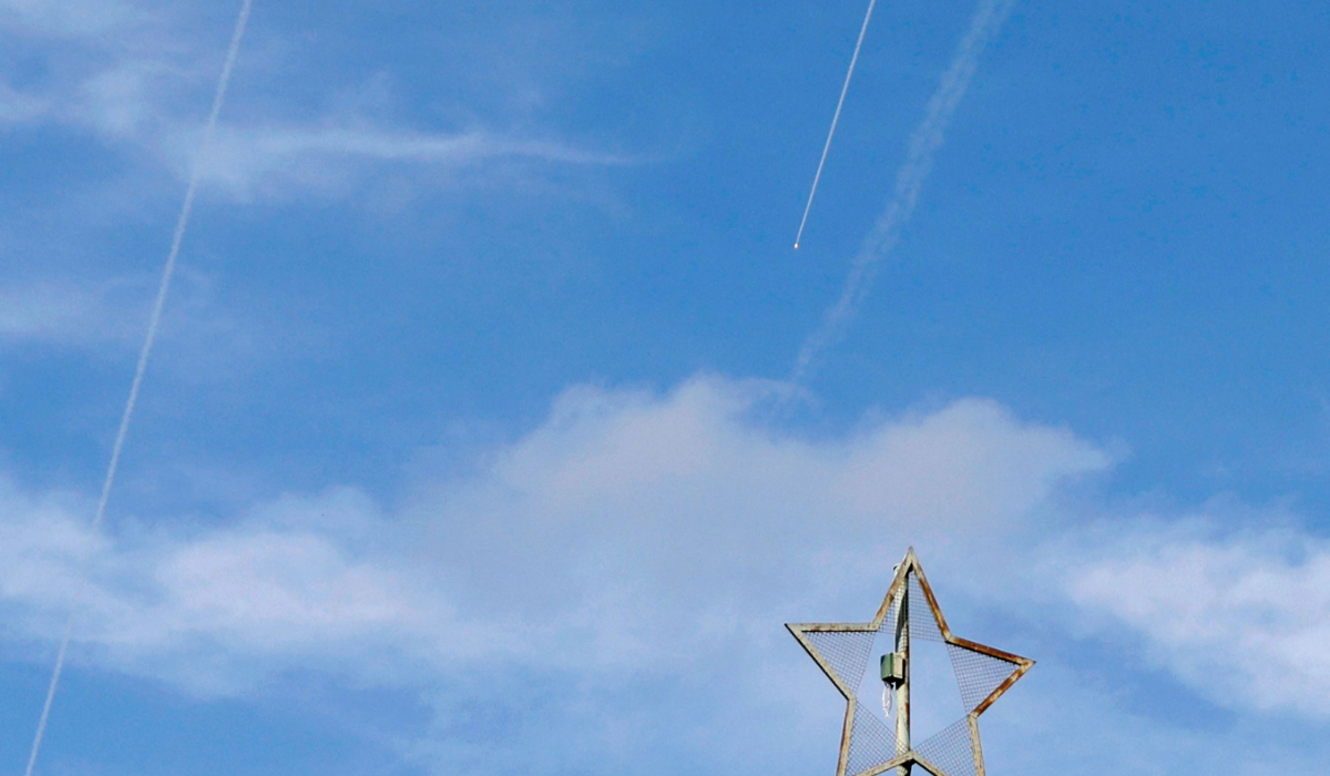 Rockets fired from southern Lebanon are intercepted by Israel's Iron Dome air defence system over the western Galilee region in northern Israel on October 13, 2024. (AFP)