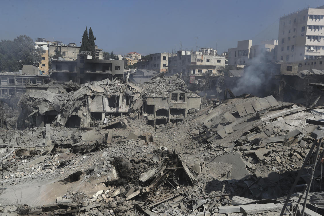 Destroyed shops and buildings at commercial street that hit Saturday night by Israeli airstrikes, in Nabatiyeh town, south Lebanon, on Oct. 13, 2024. (AP)
